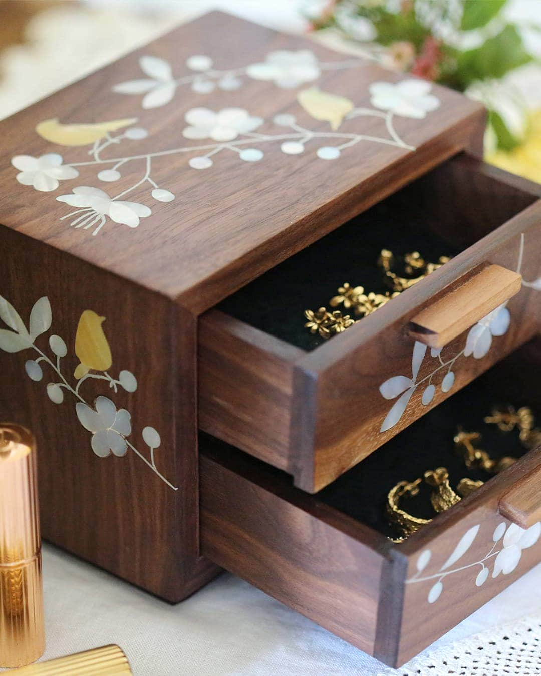 Bees in Bloom Heirloom Jewellery Box open and displaying mirror on sideboard with candlestick, flowers and makeup.