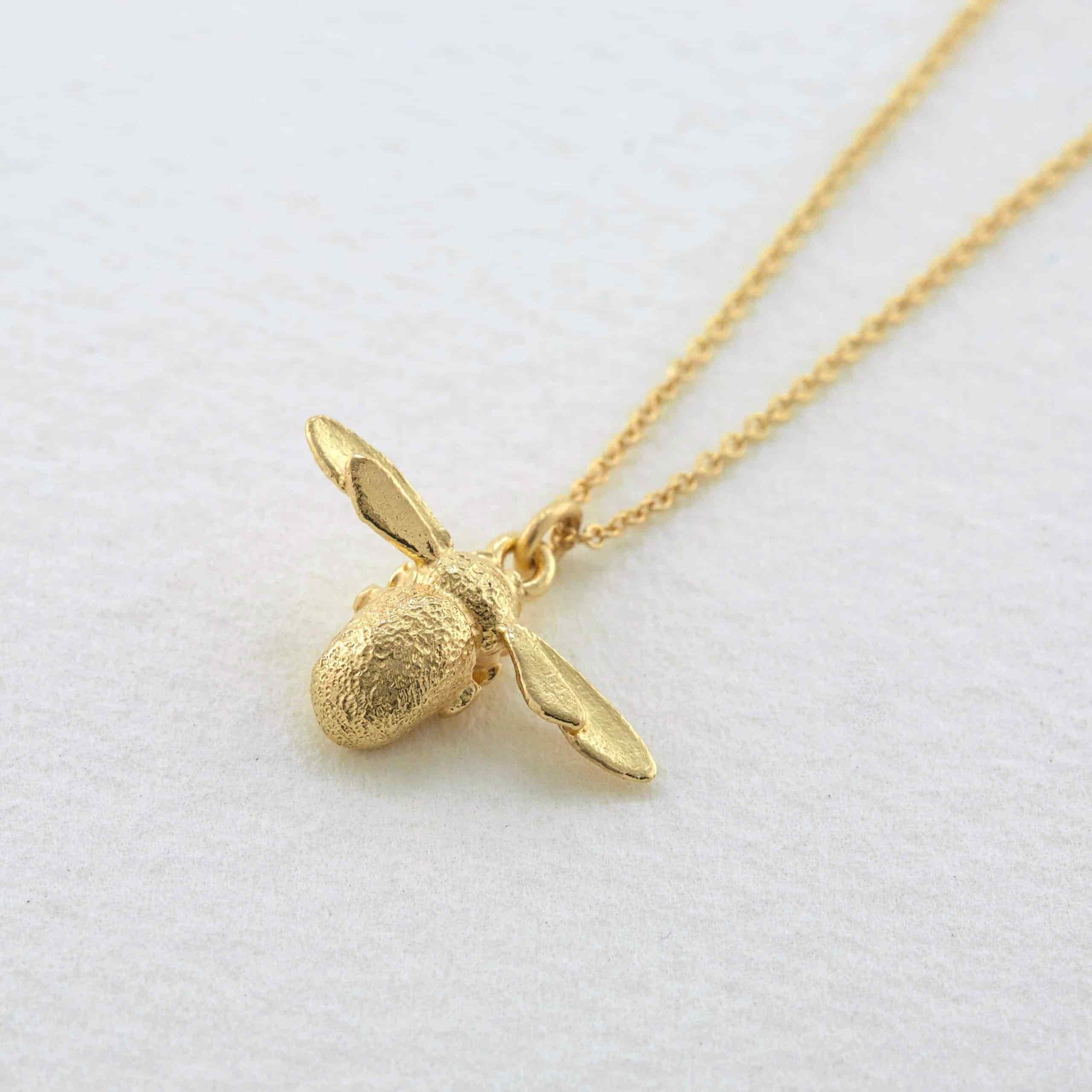  paper shot of inbetweeny bee necklace in 18ct gold Alex Monroe fine Jewellery  